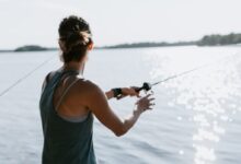 woman holding fishing rod