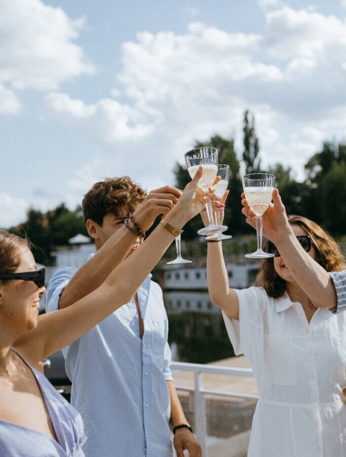 Friends Toasting their Champagne Glasses
