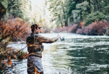 man fishing during daytime